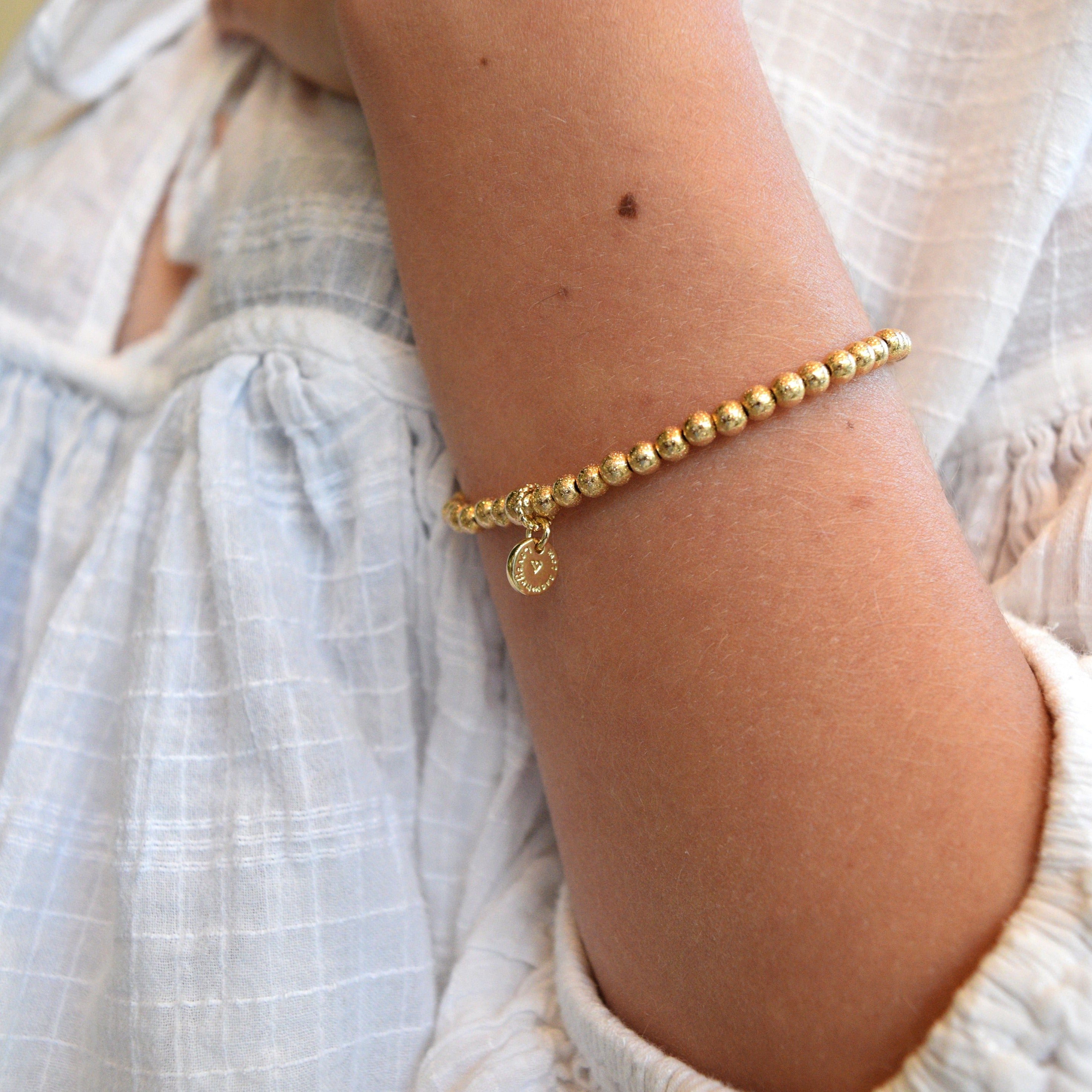 Eternity Bracelet in Gold Hammered